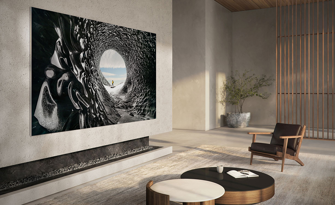 samsung's microled tv hangs on the wall of a modern home