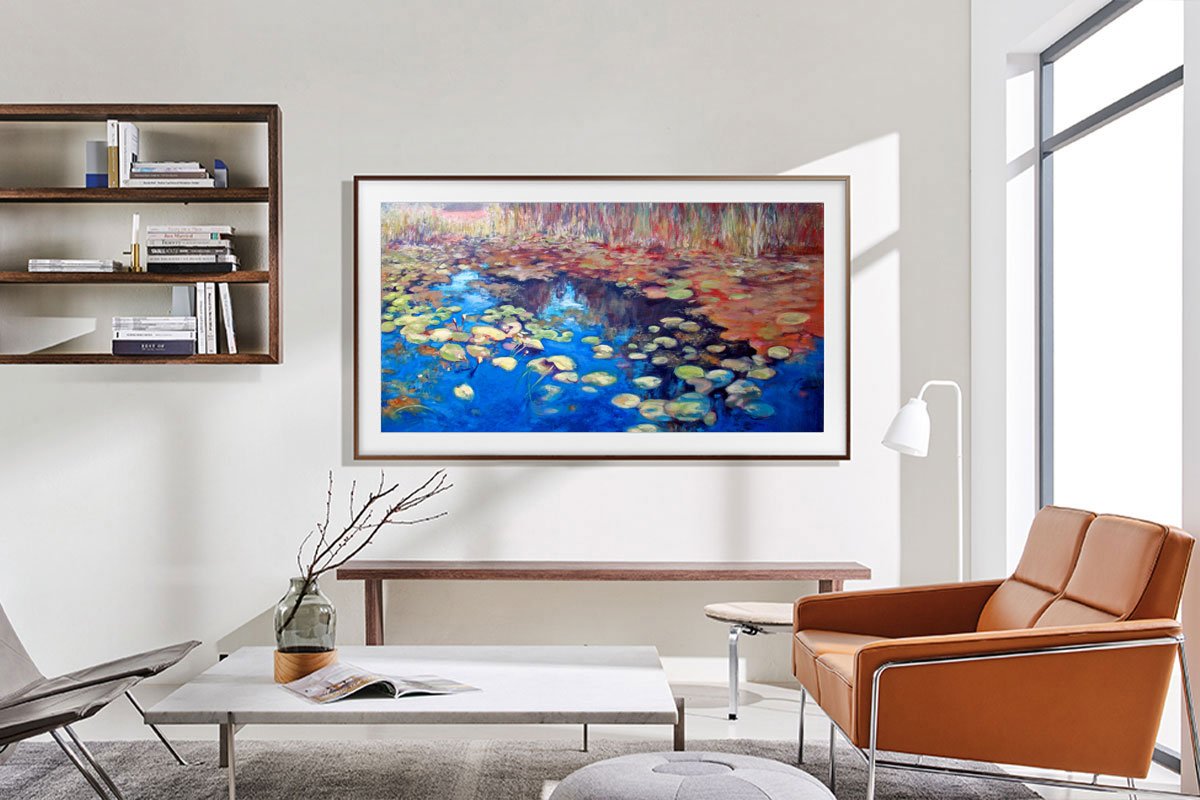 Samsung the frame in a living room displaying water lilies on a wall 