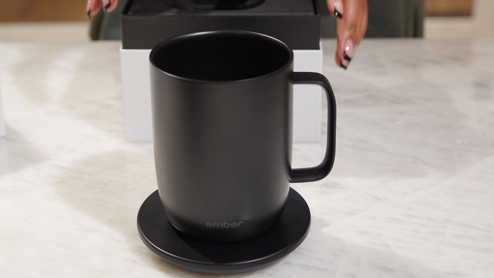 front view of black ember smart mug on a marble counter