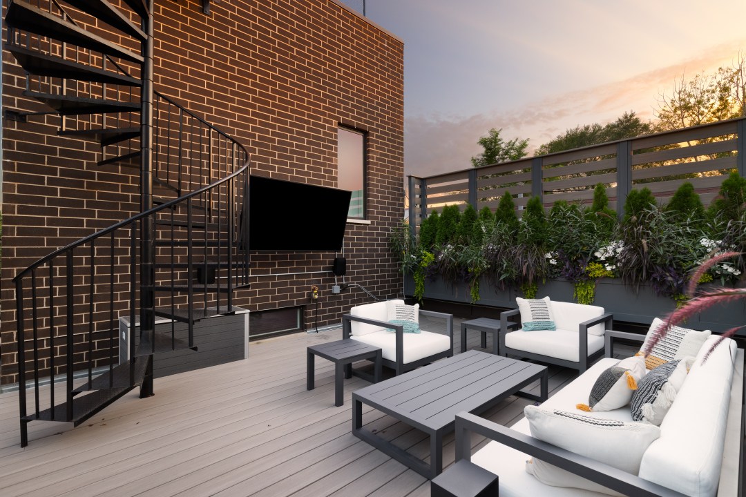 Outdoor patio area with furniture and outdoor TV.