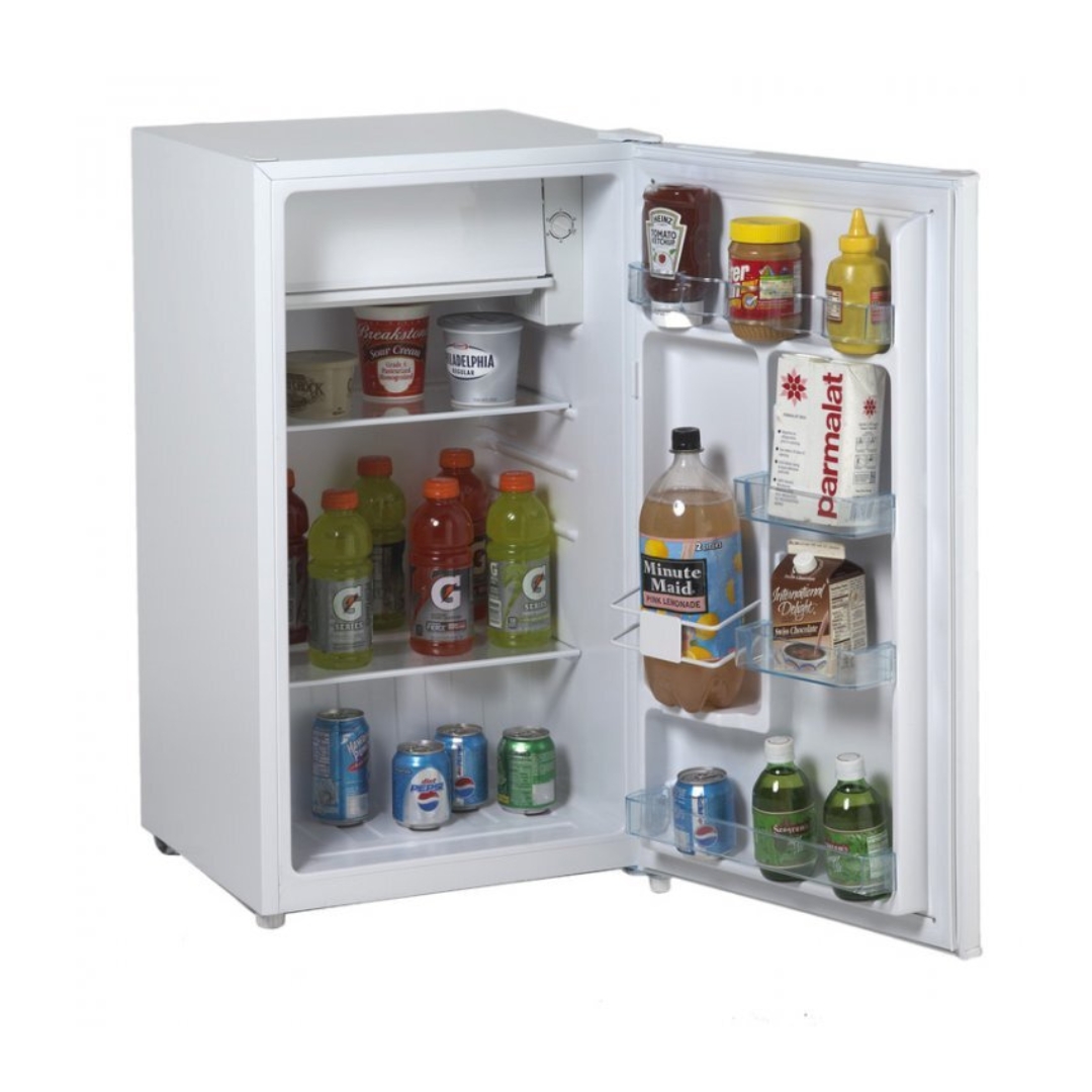 A white mini fridge dorm appliance that is open to show condiments and beverages.