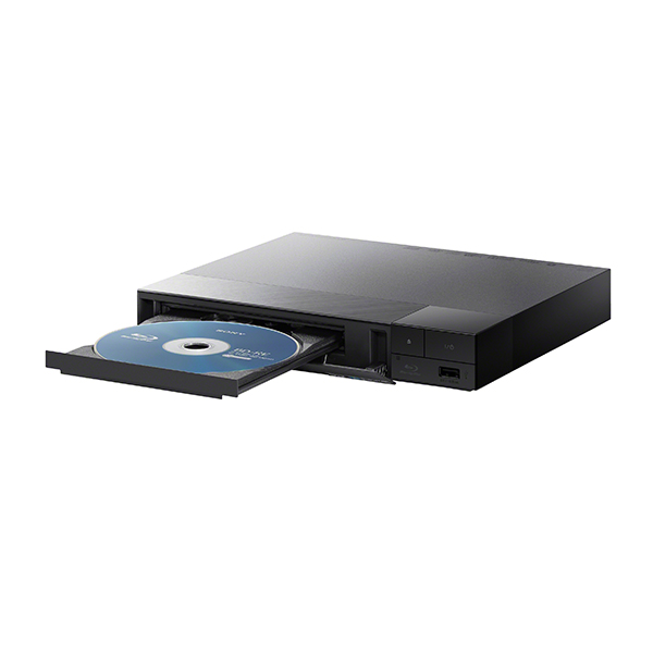 A black Blu-ray player with a movie disc sitting in it.