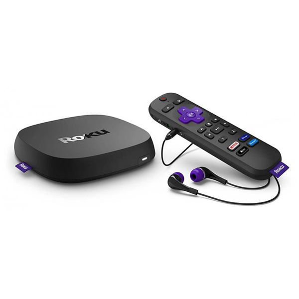 A black Roku hub with an accompanying remote next to it.