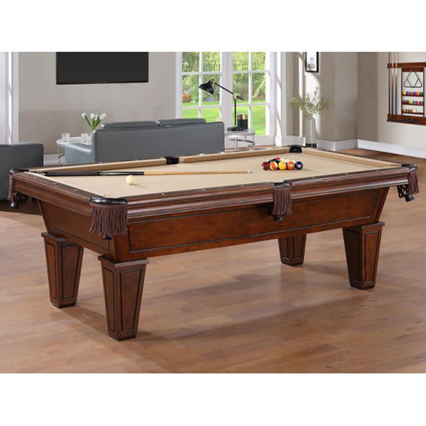 A wood pool table with a beige felt top sitting in a living room