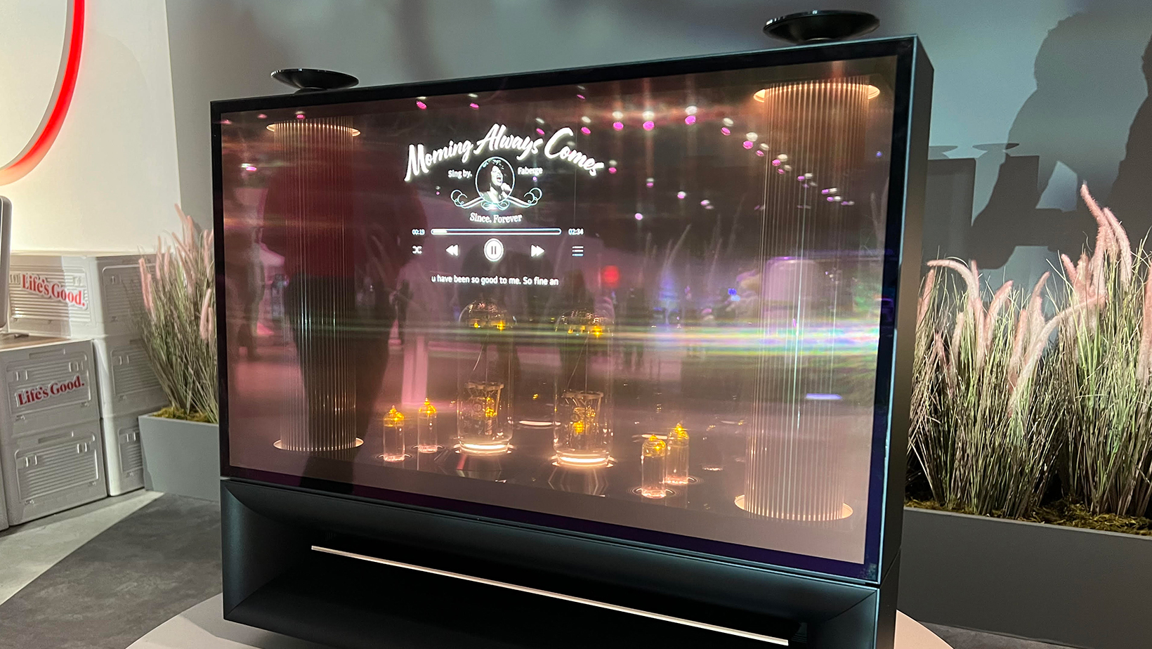 The LG Dukebox speaker/display playing music while showing the vacuum tubes through the transparent screen.