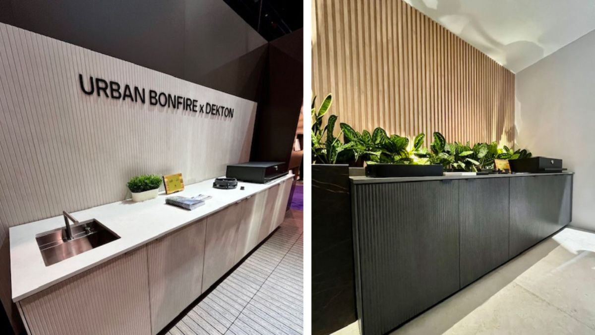The Urban Bonfire booth at KBIS 2024, with two outdoor kitchen models. One is beige and one is black