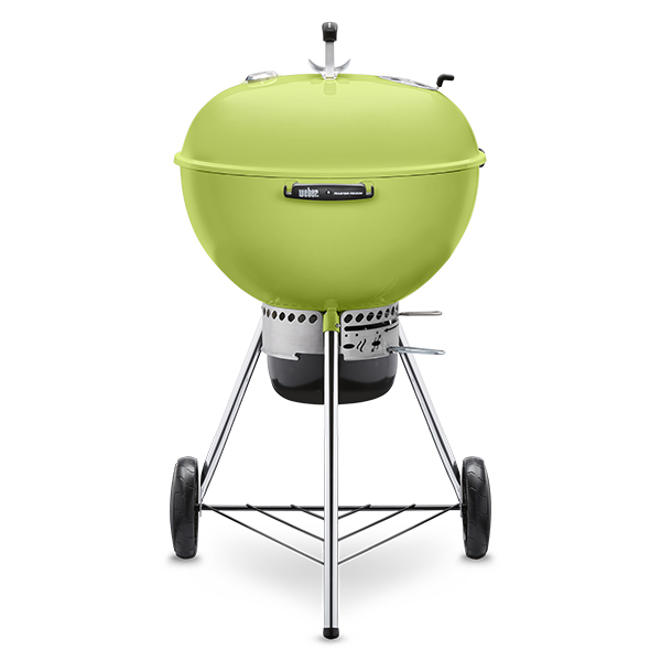 A pastel green charcoal grill with wheels